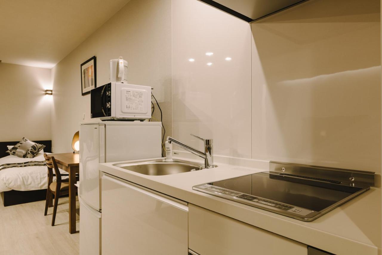 Aparthotel Grand Base Karatsu Ekiminami Esterno foto